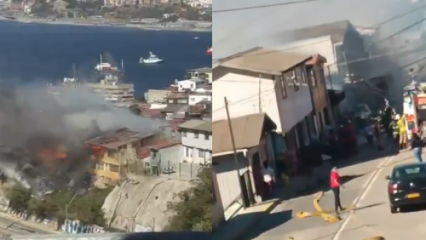 Bomberos combaten incendio que afecta a casas en cerro Cordillera de Valparaíso
