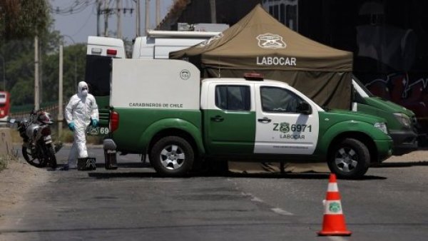 Encuentran cadáver totalmente calcinado y amarrado con alambres en La Pintana
