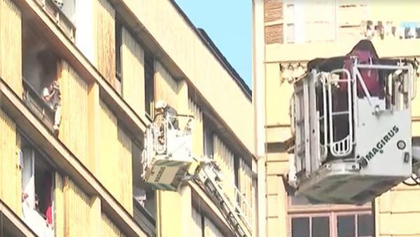 Así fue el angustiante rescate de personas atrapadas de incendio de edificio en Santiago
