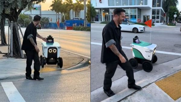 VIDEO: Joven se hace viral tras ayudar a un robot a cruzar la calle
