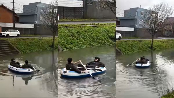 ¡Como si fuera Venecia! Jóvenes recorren en bote un canal inundado por las lluvias en Pedro Aguirre Cerda
