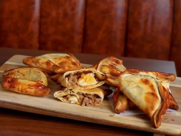 Mucho más que empanadas: los platos chilenos que vuelven a la mesa en septiembre